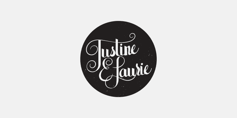 Justine E. Laurie logo